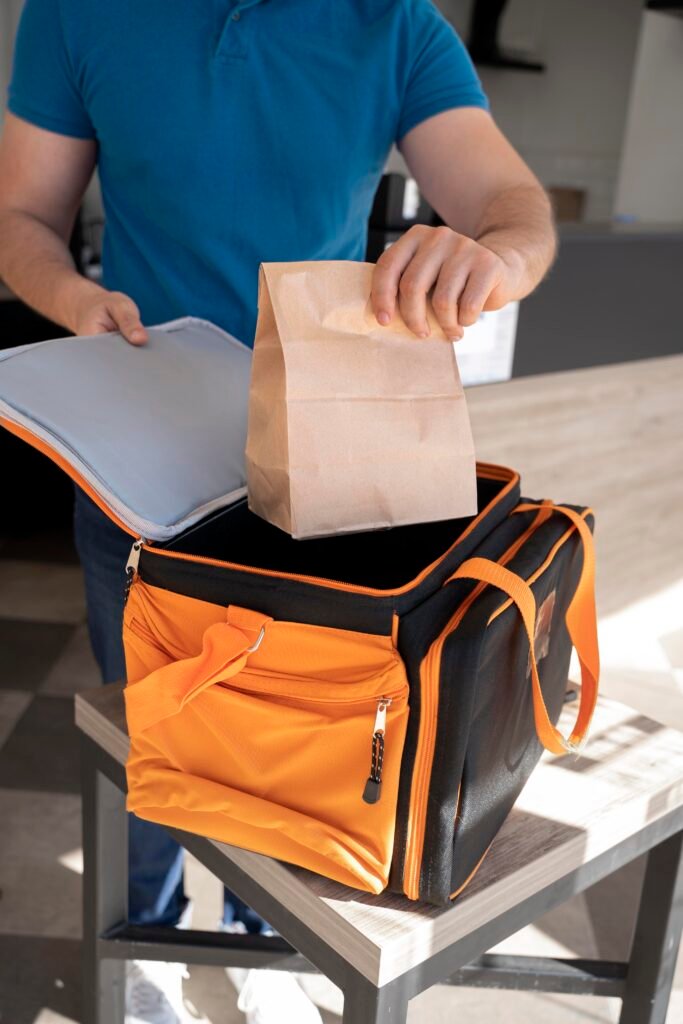 man-preparing-takeaway-food-delivery